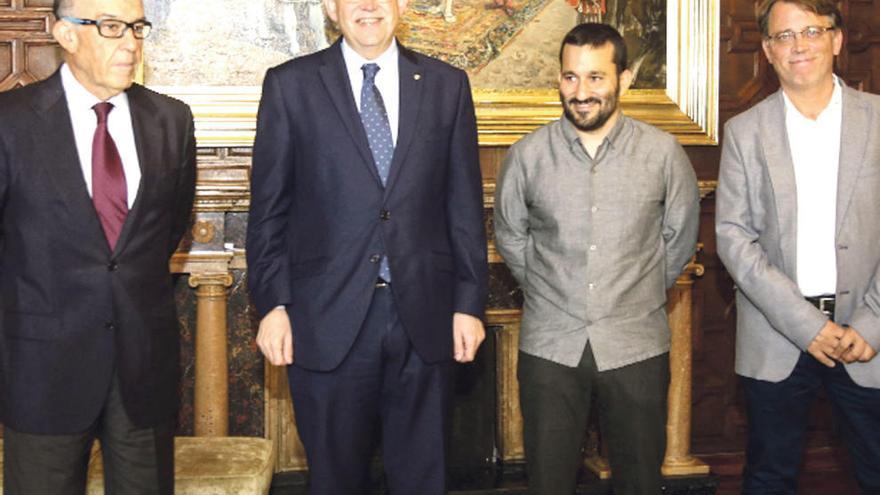 Carmelo Ezpeleta,  Ximo Puig, Vicent Marzà y Josep Miquel Moya, ayer en el Palau.