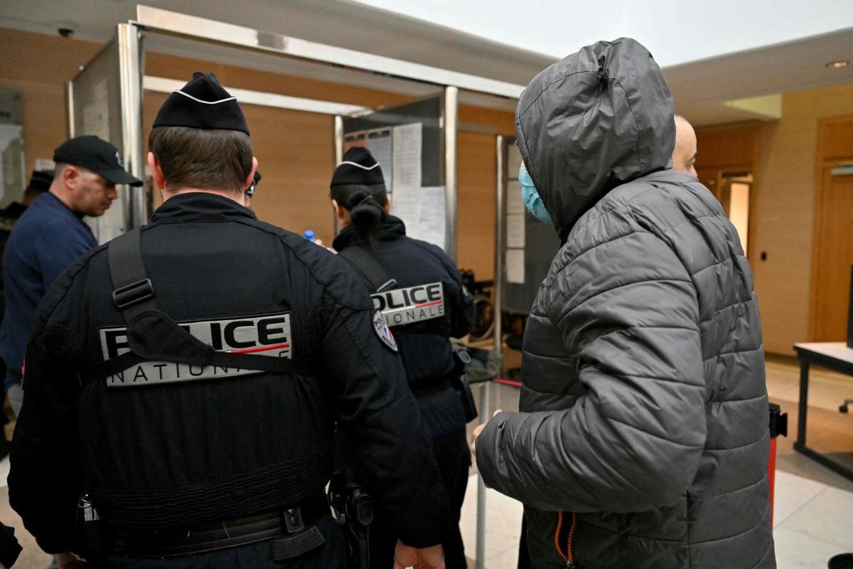 One of the defendant arrives at the courthouse in Avignon on December 19, 2024, as the verdict is expected in the trial of a man, with 50 others, accused of drugging his wife and orchestrating multiple rapes over nearly a decade. A court in the French southern town of Avignon is trying Dominique Pelicot, a 71-year-old retiree, for repeatedly raping and enlisting dozens of strangers to rape his heavily sedated wife Gisele Pelicot in her own bed over a decade. Fifty other men, aged between 26 and 74, are also on trial for alleged involvement, in a case that has horrified France. (Photo by Miguel MEDINA / AFP)