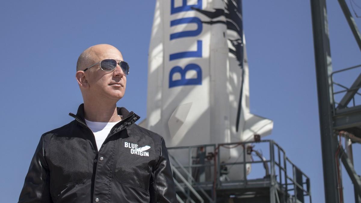 This April 24, 2015 handout photograph obtained courtesy of Blue Origin shows Jeff Bezos, founder of Blue Origin, at New Shepard’s West Texas launch facility before the rocket’s maiden voyage.