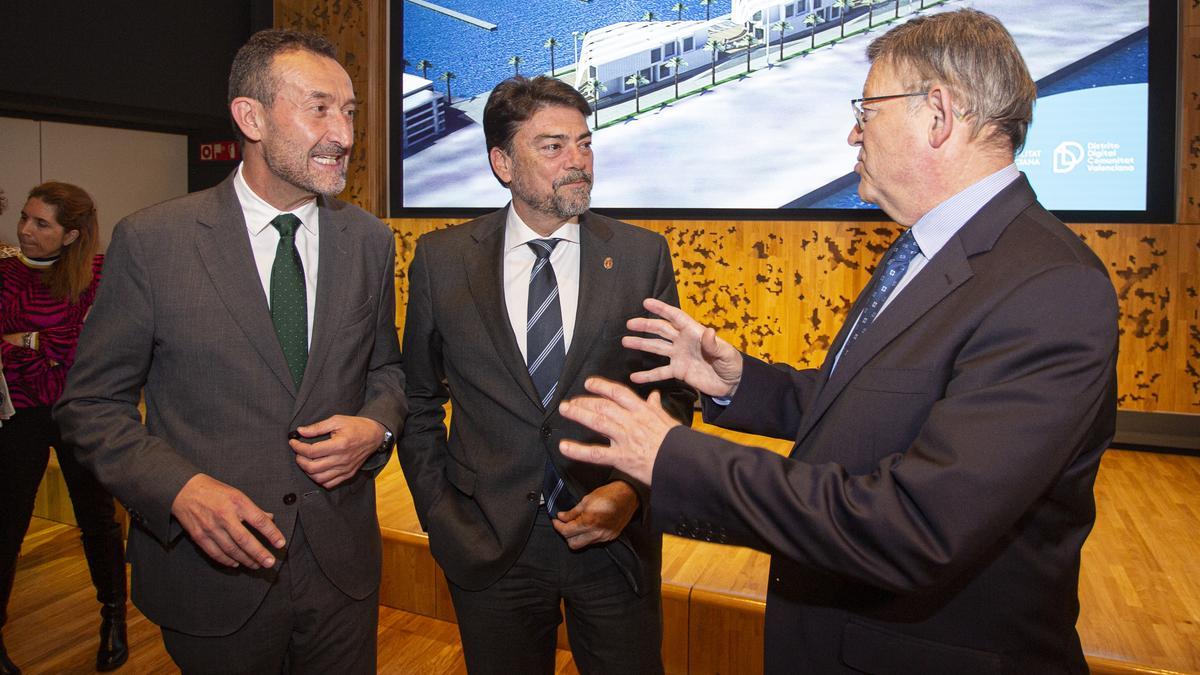 El presidente Puig con los alcaldes de Elche y de Alicante cuando se presentaron las candidaturas en Madrid