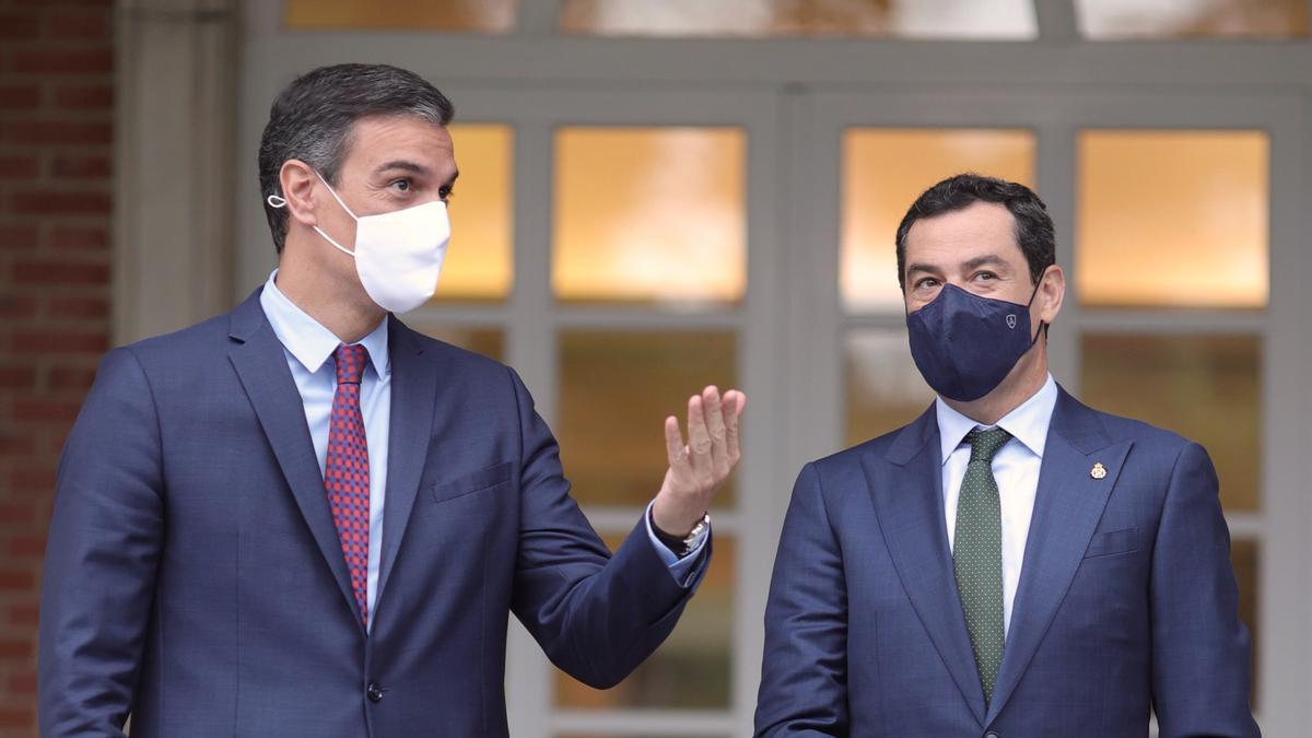 El presidente del Gobierno, Pedro Sánchez y el presidente de la Junta de Andalucía, Juanma Moreno, en una fotografía de archivo