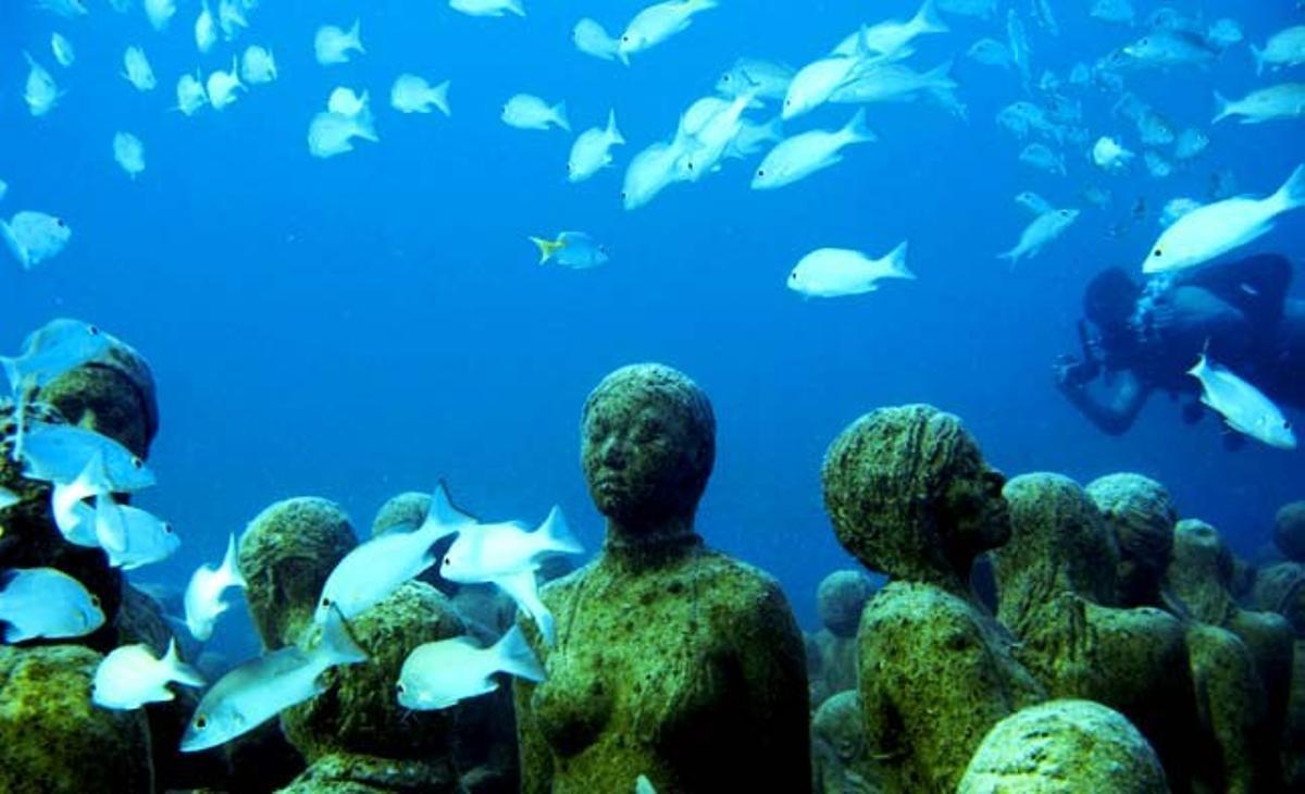 Part de la instal·lació d’escultura sota l’aigua L’evolució silenciosa, de l’artista britànic Jason de Caires Taylor, que està exposada entre Cancún i la Isla Mujeres (Mèxic).