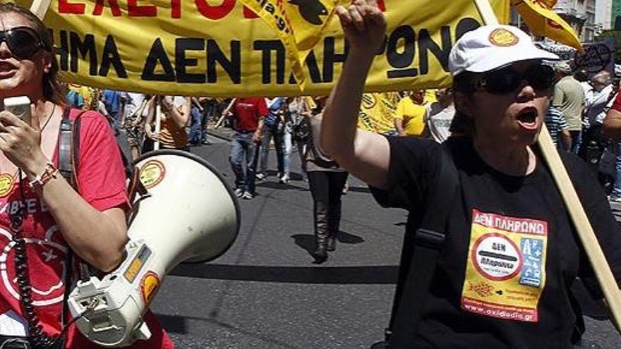 Trabajadores inmigrantes, en una protesta en Grecia.