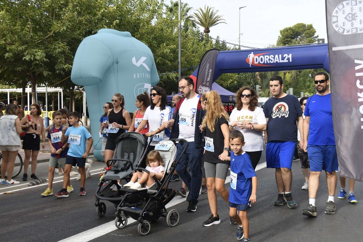 La carrera y marcha Solidaria Asteamur, en imágenes