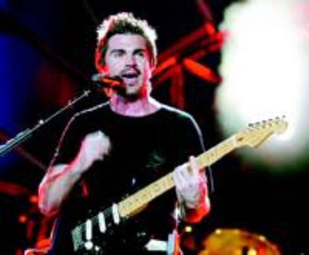 Juanes i la seva guitarra, al recital del Sant Jordi. Juanes i la seva guitarra, al recital del Sant Jordi.