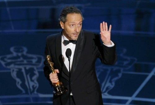 Emmanuel Lubezki accepts the Oscar for best cinematography for the film "Birdman" at the 87th Academy Awards in Hollywood