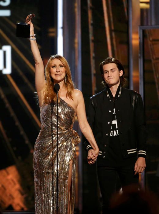 Billboard Icon Award recipient Celine Dion holds ...