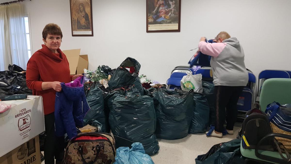 Voluntarias en el centro de orientación familiar San Juan Pablo II de Lucena.