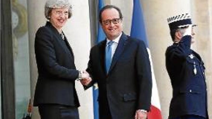 May i Hollande es van reunir al Palau de l&#039;Elisi.