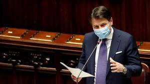 FILE PHOTO  Italian Prime Minister Giuseppe Conte addresses the lower house of parliament during a session on the coronavirus disease  in Rome  Italy  November 2  2020  REUTERS Remo Casilli File Photo