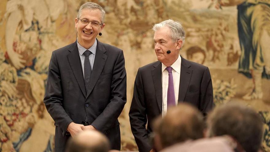 El presidente de la Reserva Federal, Jerome Powell, y el gobernador del Banco de España, Pablo Hernández de Cos.