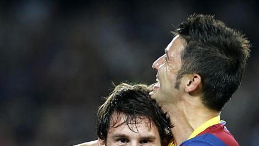 Messi y Villa celebran uno de los tantos anotados por el F.C. Barcelona ayer.