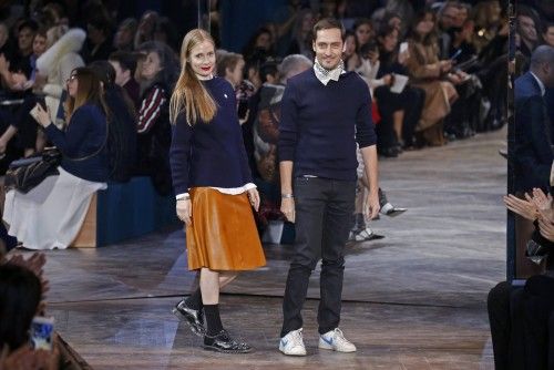 Swiss designers Serge Ruffieux and Lucie Meier appear at the end of their Haute Couture Spring/Summer 2016 fashion show for Dior in Paris