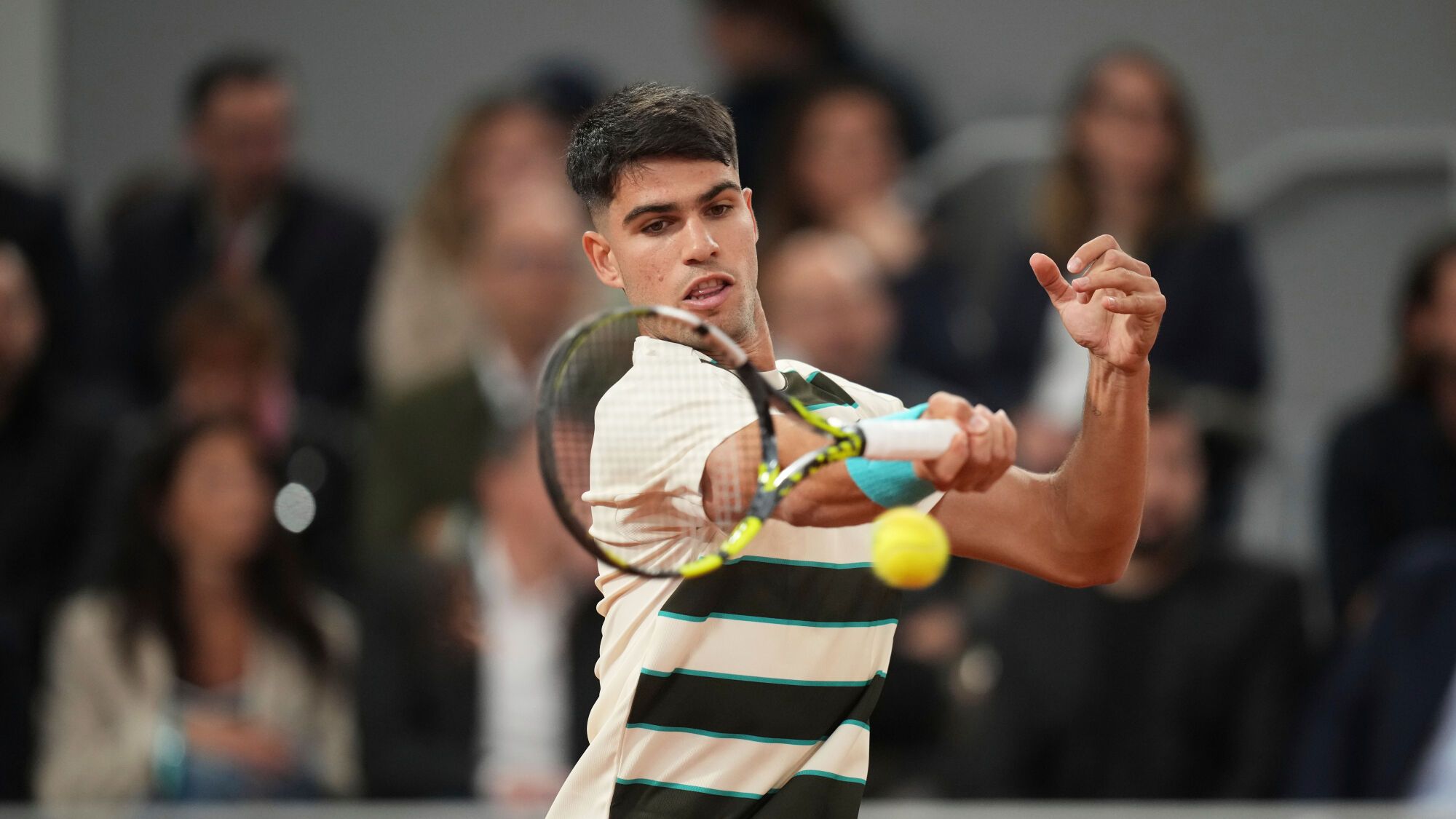 Spain's Carlos Alcaraz returns the ball to Portugal's Nuno Borges during their second round match of the French Tennis Open, at the Roland-Garros stadium, in Paris, Wednesday, May 28, 2025. (AP Photo/Christophe Ena)