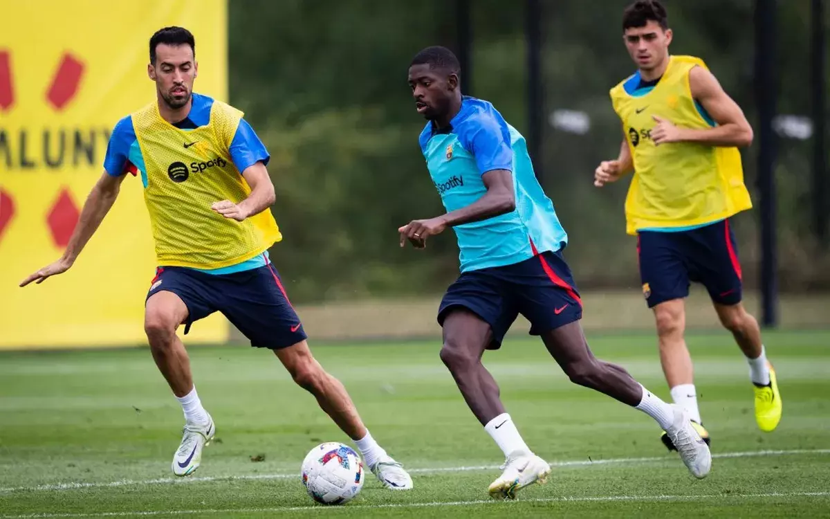 Busquets y Dembélé, en un entrenamiento.