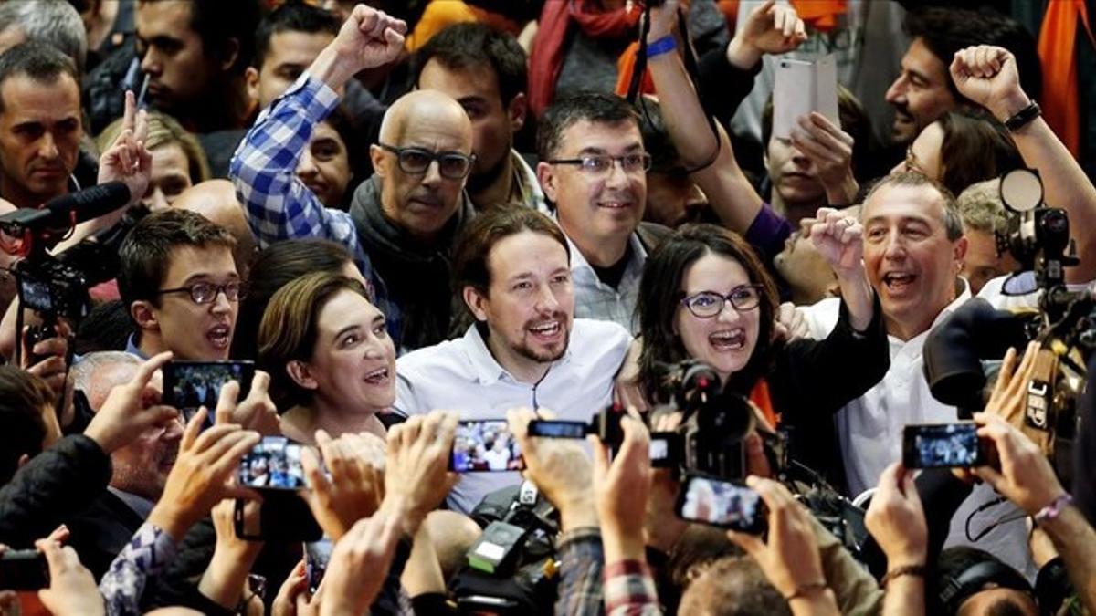 Pablo Iglesias, Ada Colau y Mònica Oltra en el mitin de Valencia