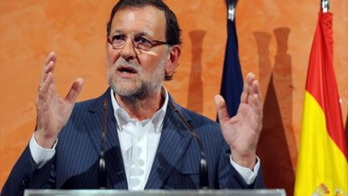 Rajoy atiende a los medios, el pasado martes, 4 de agosto, en La Palma del Condado (Huelva).