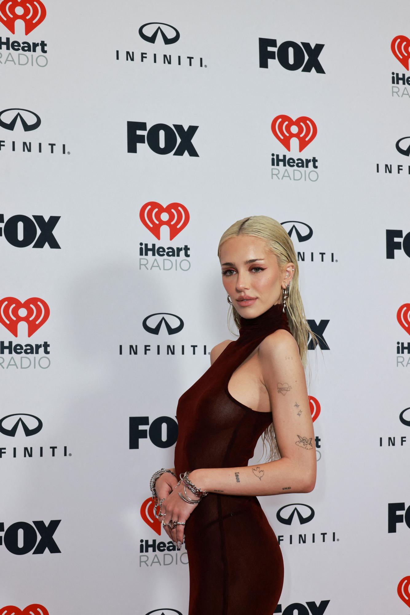 Las mejores imágenes de la alfombra de los iHeartRadio Music Awards 2023