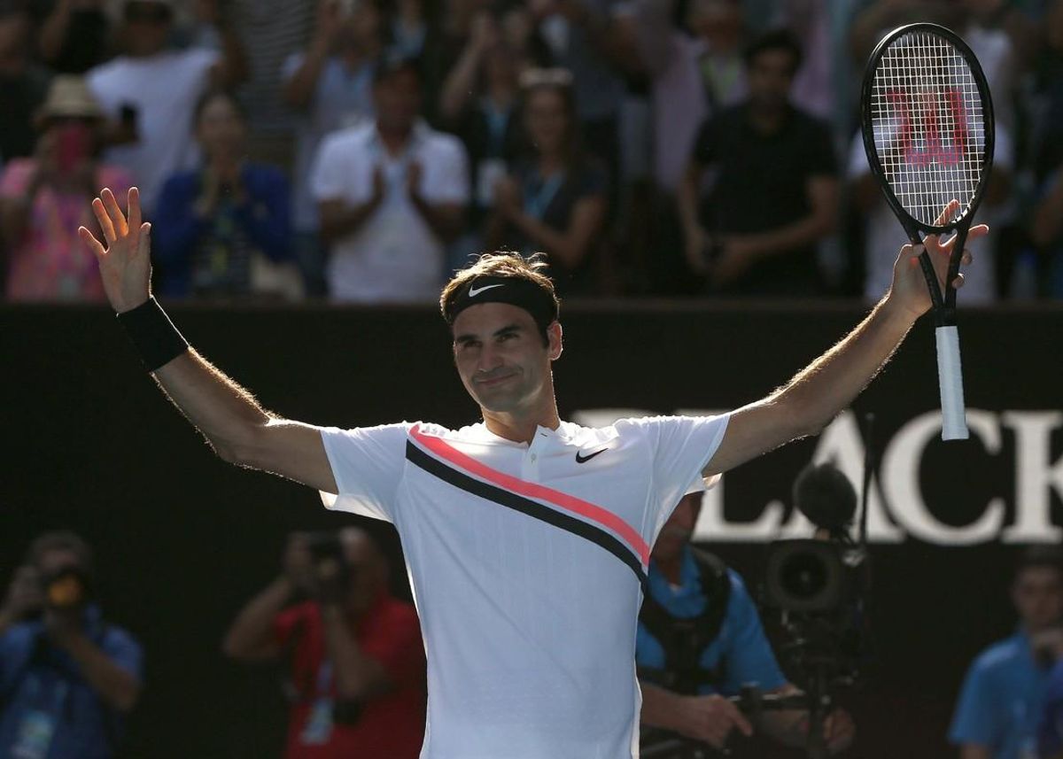 Tennis - Australian Open - Rod Laver Arena, Melbourne, Australia, January 22, 2018. Roger Federer of Switzerland celebrates winning against Marton Fucsovics of Hungary. REUTERS/Thomas Peter