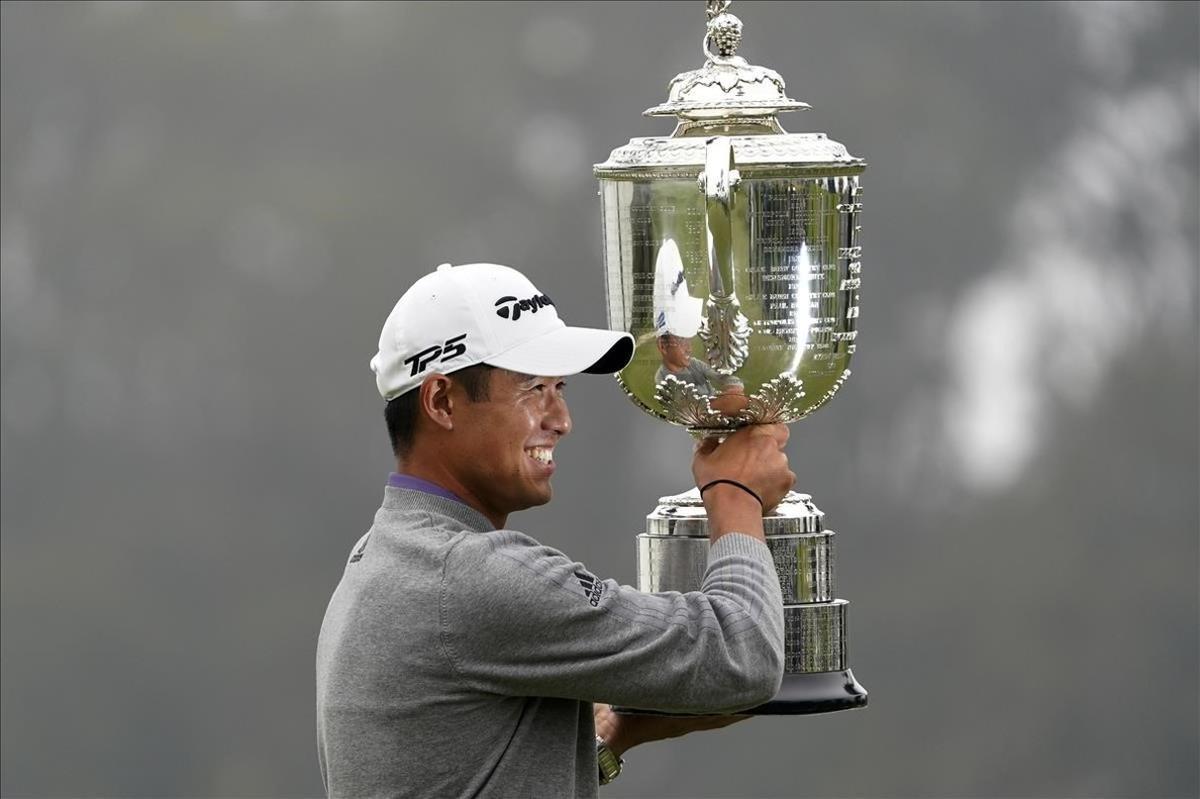 lmendiola54433654 collin morikawa holds the wanamaker trophy after winning the200810110028