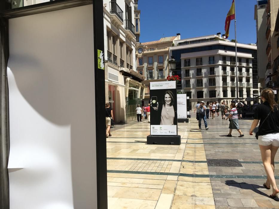 Daños en la exposición de la AECC en la calle Larios.