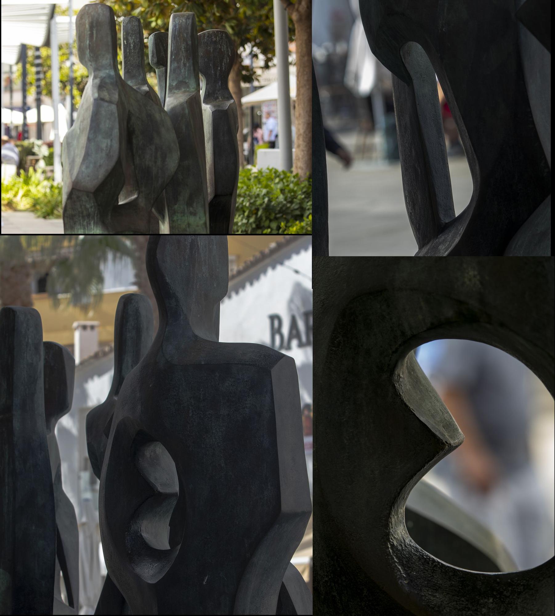 Detalle de la escultura 'Los  Oficios', en su nueva ubicación en la plaza de la Costa del Sol