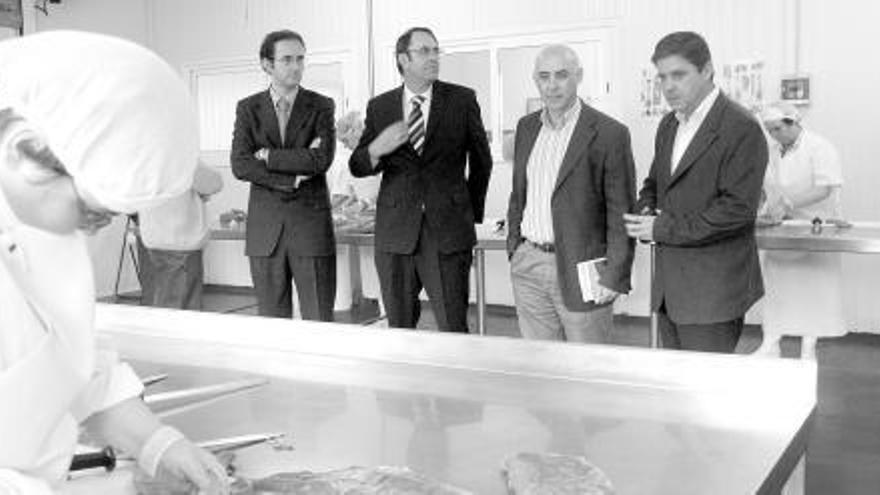 Juan Díaz, César García, César Movilla y Enrique Rodríguez Nuño, ayer, durante la visita.