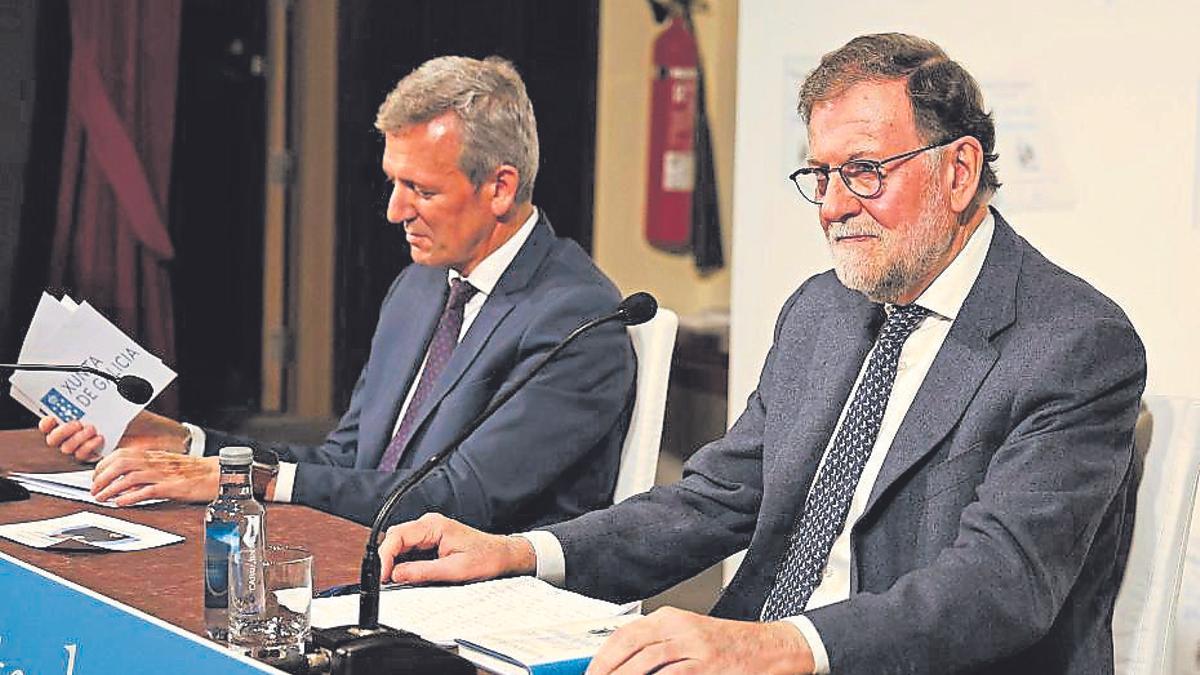 Rueda y Rajoy, momentos antes de la presentación. | A. Hernández