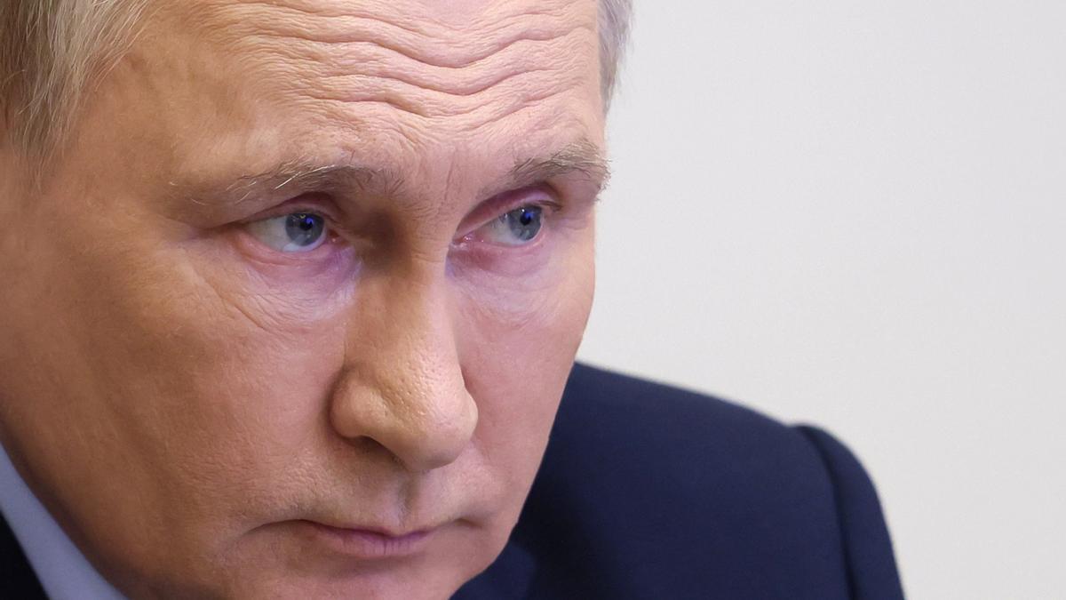 Russian President Vladimir Putin attends teleconference call