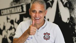 FILE - In this Dec  5  2015 file photo  Corinthians soccer coach Adenor Leonardo Bacchi  known as Tite  flashes a thumbs up as he poses after a team training session at the Itaquerao stadium  in Sao Paulo  Brazil  On Wednesday  June 15  2016  the president of the Corinthians football club announced that Tite  has been named the new coach of Brazil s national team   AP Photo Andre Penner  File