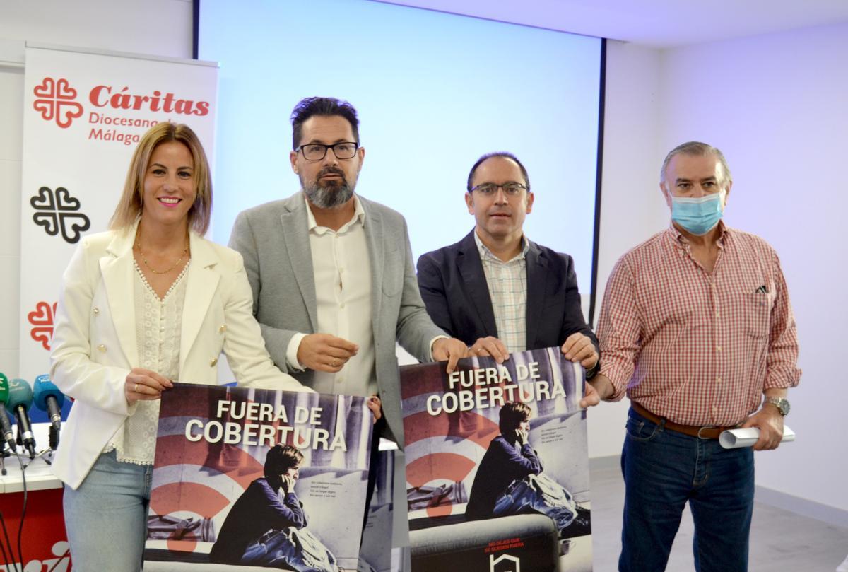 Rueda de prensa en la sede de Cáritas en Málaga