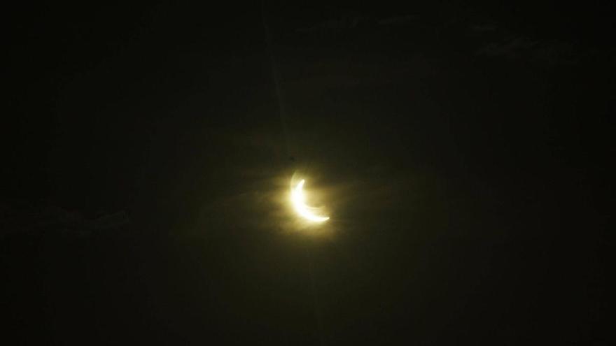 Eclipse solar en Málaga, en imágenes