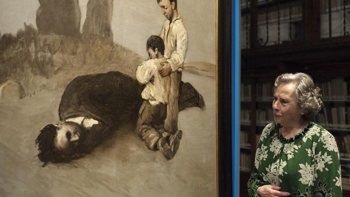 Amalia Bóveda ante el cuadro de Castelao, «A derradeira leición do mestre», en 2019