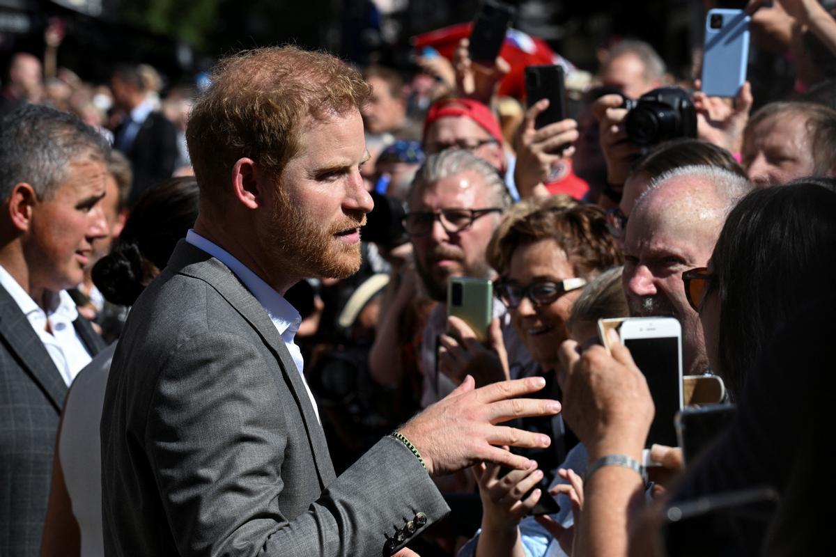 Britain's Prince Harry and his wife Meghan in Dusseldorf