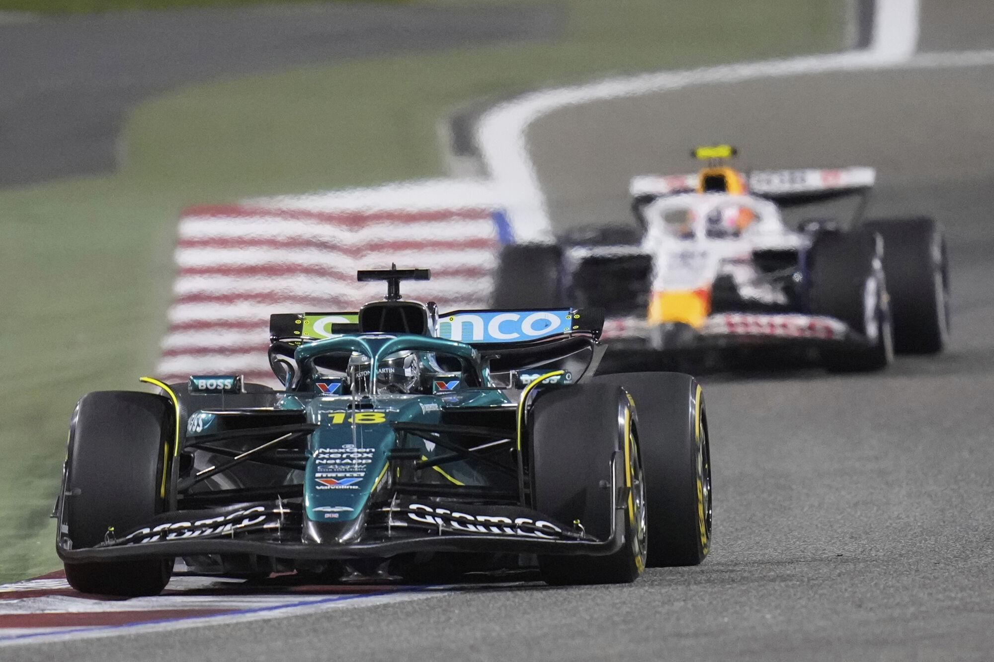 Aston Martin driver Lance Stroll of Canada in action during the the Formula One Bahrain Grand Prix, in Sakhir, Sunday, April 13, 2025. (AP Photo/Darko Bandic)