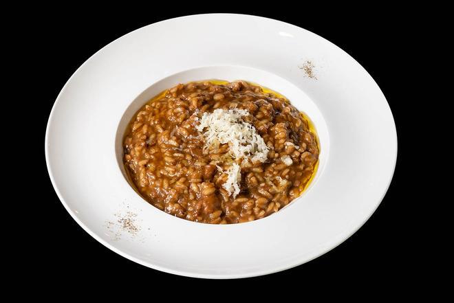 Arroz cremoso del Delta del Ebro con butifarra, berenjena ahumada y queso de Ca la Nuri