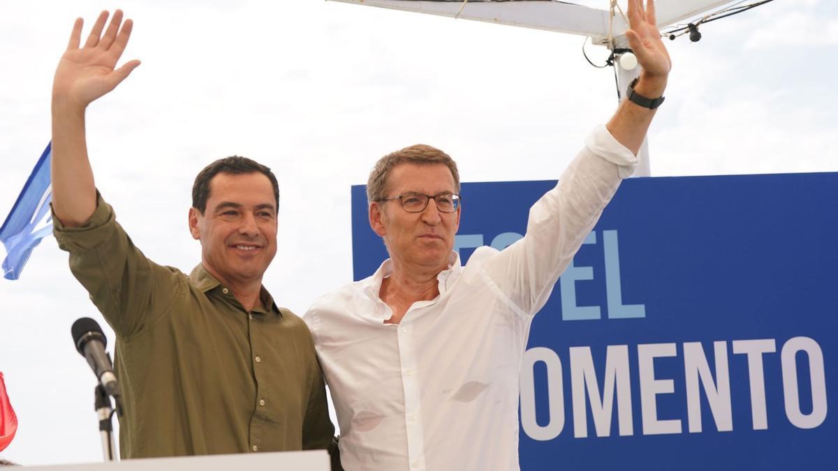 Moreno y Feijóo durante el mitin del PP celebrado este viernes en los Baños del Carmen.