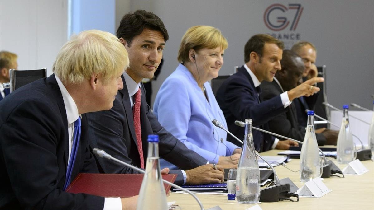 Boris Johnson, Justin Trudeau, Angela Merkel y Emmanuel Macron, durante la reunión del G-7 en Biarritz el pasado agosto.