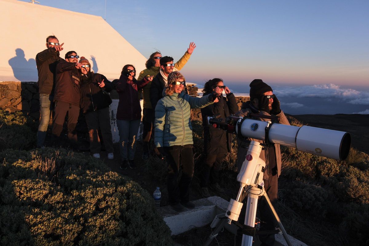 Several people observe the solar eclipse from the Teide Observatory, in Izaña (Tenerife)