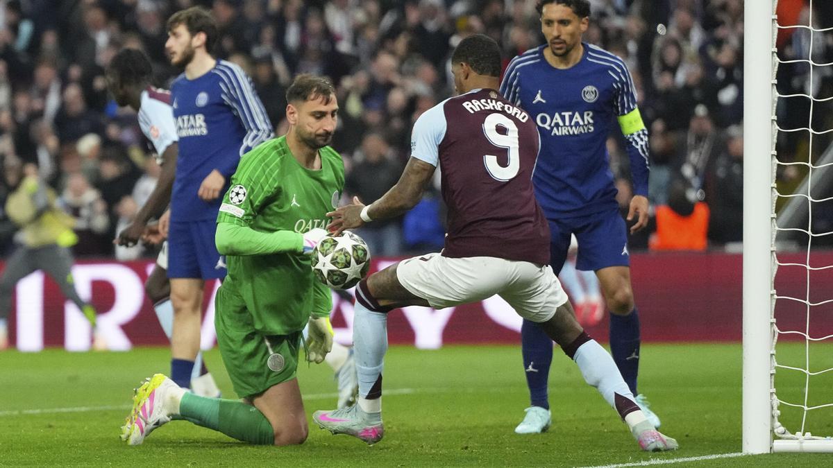 PSG's goalkeeper Gianluigi Donnarumma grimaces after Aston Villa's Ezri Konsa scored his side's third goal during the Champions League quarterfinal second leg soccer match between Aston Villa and Paris Saint-Germain at the Villa Park stadium, in Birmingham, England, Tuesday, April 15, 2025. (AP Photo/Frank Augstein)