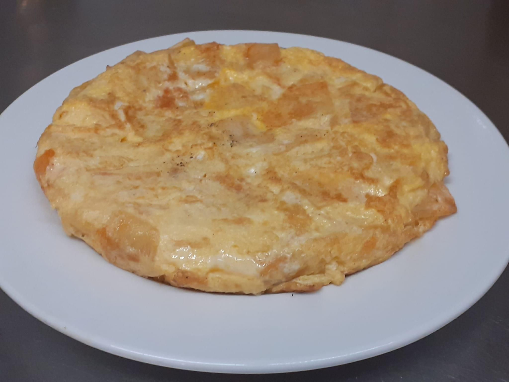 La tortilla de patatas de Casa Herminia. No hace falta decir más.