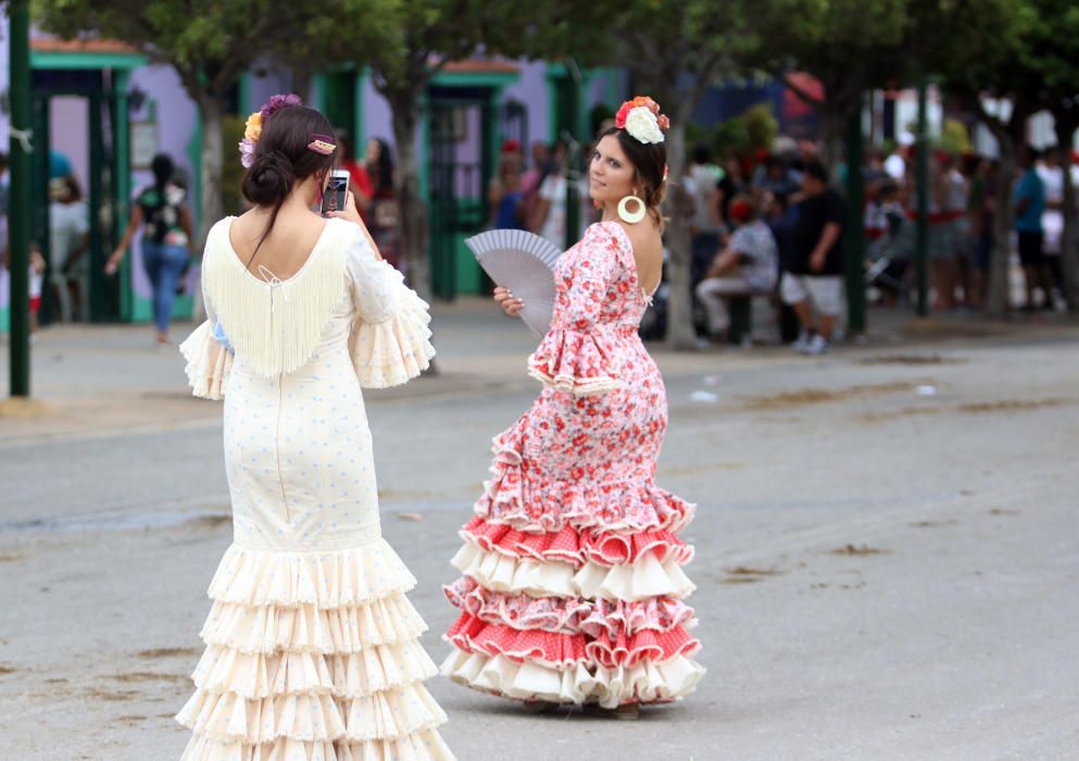 Ambiente en el Real de la Feria de Málaga del martes 16 de agosto.