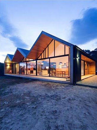 Casas prefabricadas de madera y cristaleras.