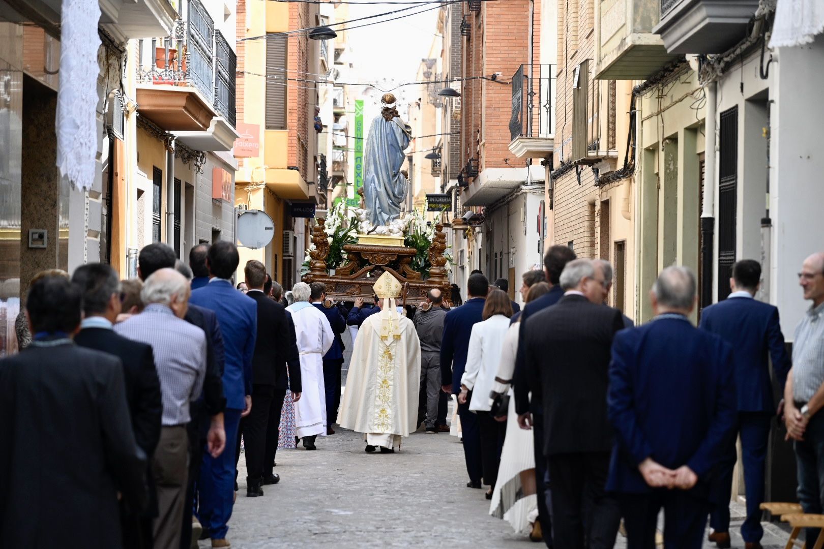 Búscate en las fotos de la misa y procesión de Els Lluïsos de Vila-real