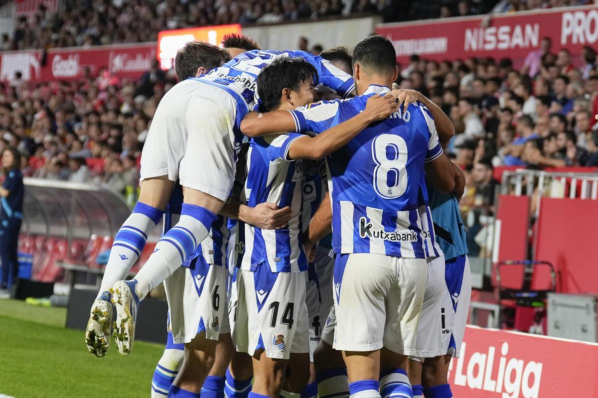 Real Sociedad’s Takefusa Kubo (2-L) celebrates after scoring during a Spanish LaLiga soccer match between Girona and Real Sociedad at Montilivi stadium in Girona, Catalonia, north eastern Spain, 02 October 2022. EFE/ David Borrat