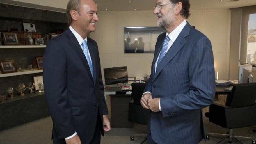 Alberto Fabra y Mariano Rajoy, durante el encuentro que mantuvieron ayer en Madrid.