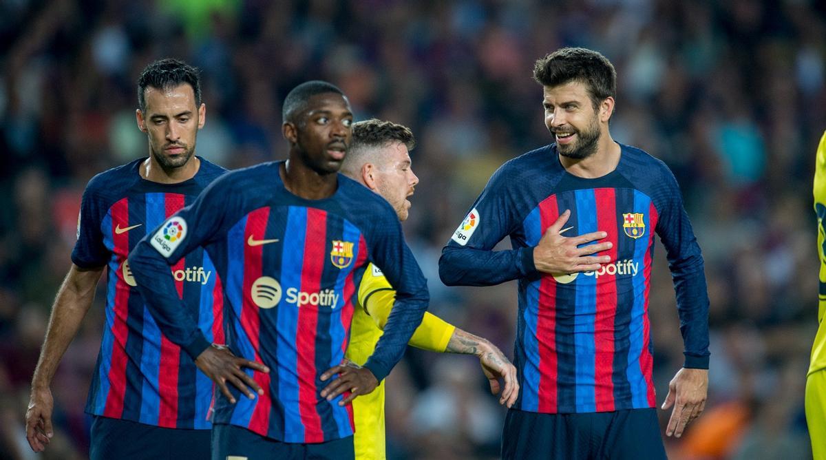 Busquets, Dembélé y Piqué, en el Camp Nou tras el 3-0 al Villarreal.