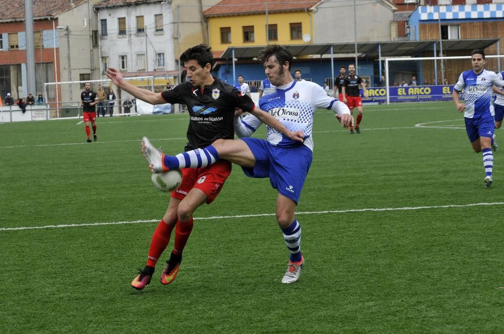 El partido entre el Tuilla y el Langreo, en imágenes