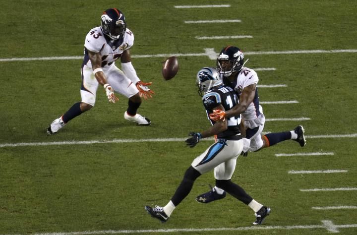 Denver Broncos' T.J. Ward makes an interception against the Carolina Panthers during the third quarter of the NFL's Super Bowl 50 football game in Santa Clara