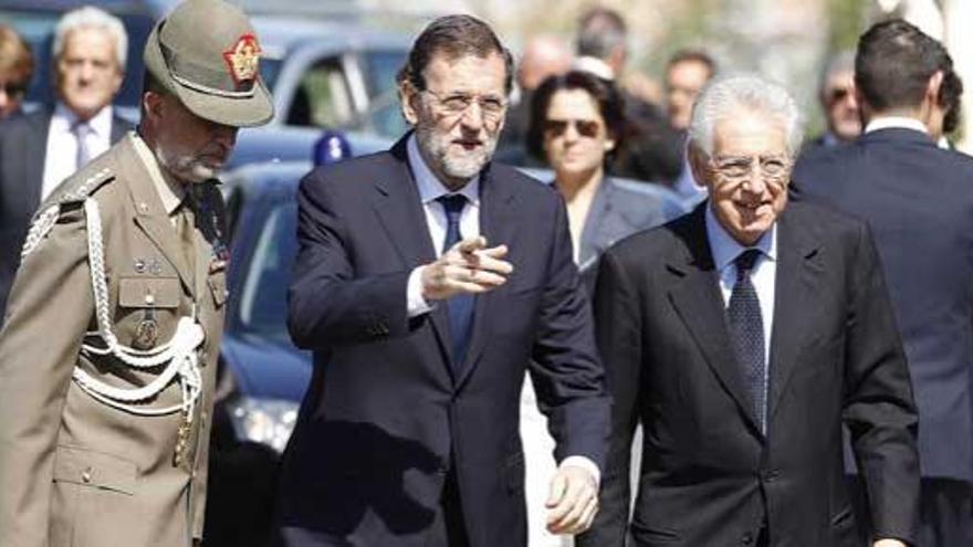 Rajoy y Monti, antes de la reunión.